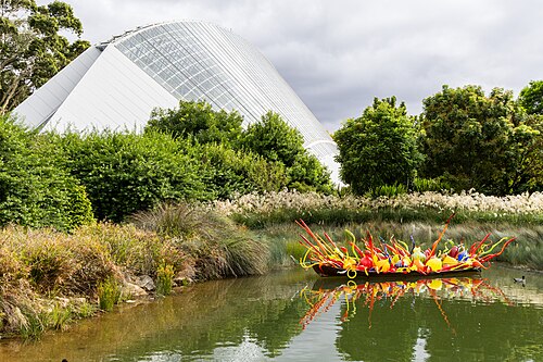 Palm House, Adelaide Botanic Garden, Adelaide — Fiori Boat (2018) by Dale Chihuly, on display at the Adelaide Botanic Garden with the…