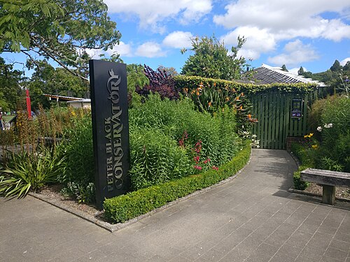 Peter Black Conservatory (Victoria Esplanade), Palmerston North, Manawatū-Whanganui — The entrance to the Peter Black Conservatory, in the Victoria Esplanade, Palmerston…
