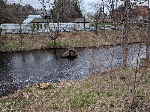 Talcott Greenhouse (Mount Holyoke College), South Hadley, Massachusetts — A remaining pier of a former footbridge on the Mount Holyoke College campus, seen in…